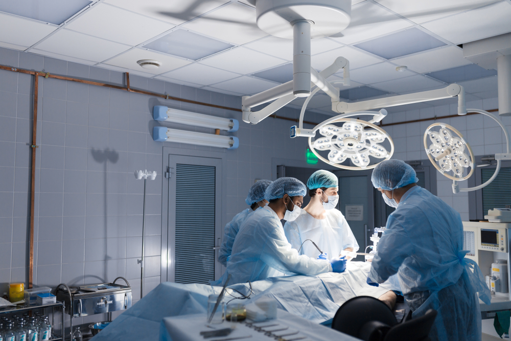 A surgeon performs a minimally invasive surgery