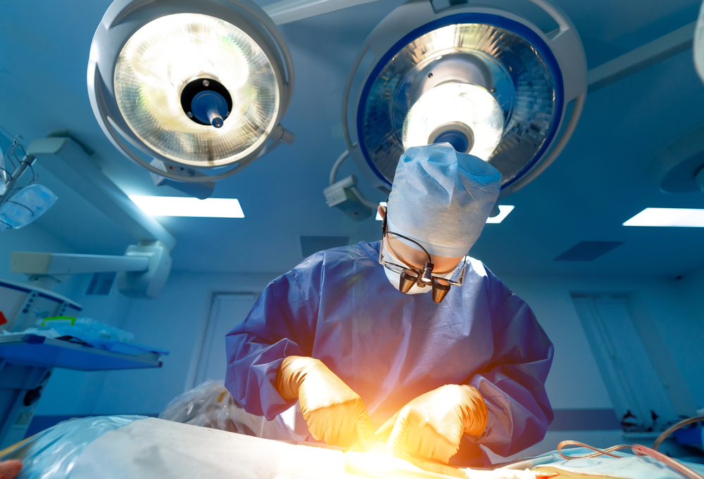 A surgeon performs a minimally invasive surgery